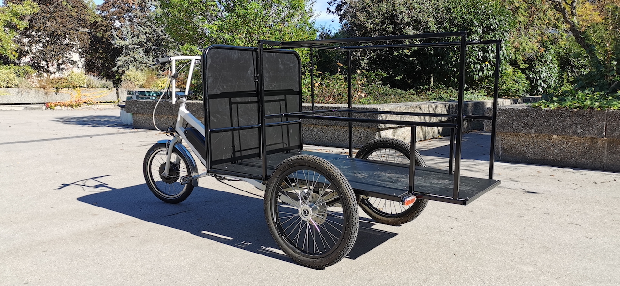 Macadam cargo Genève. Adaptation vélo triporteur sur mesure.
